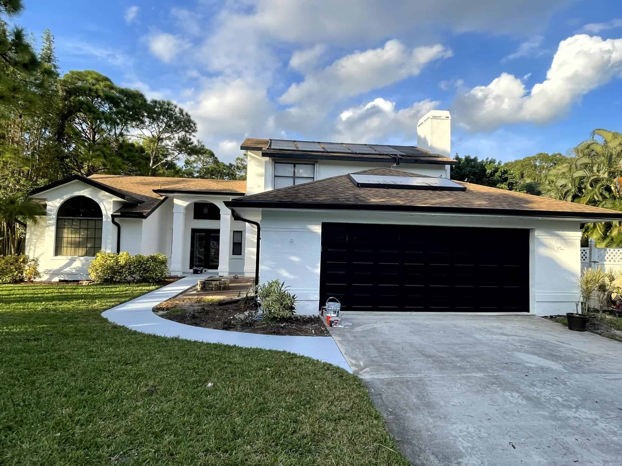 White House with Black Garage Door